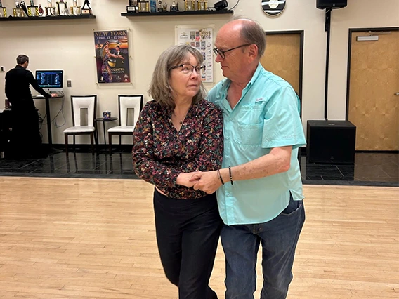 Sarah Holzman and partner ballroom dancing