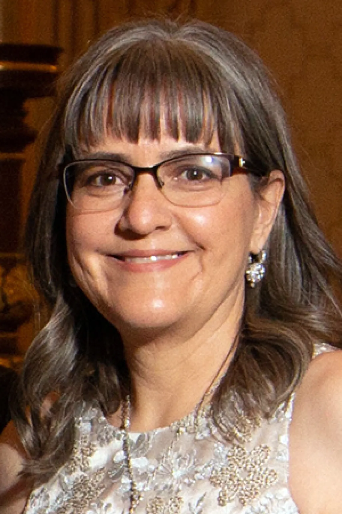 Yvette Mathesen wearing a white dress